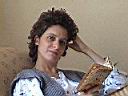 Banu reading to learn more about child-care.